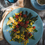 Grilled asparagus, cherry tomatoes and corn