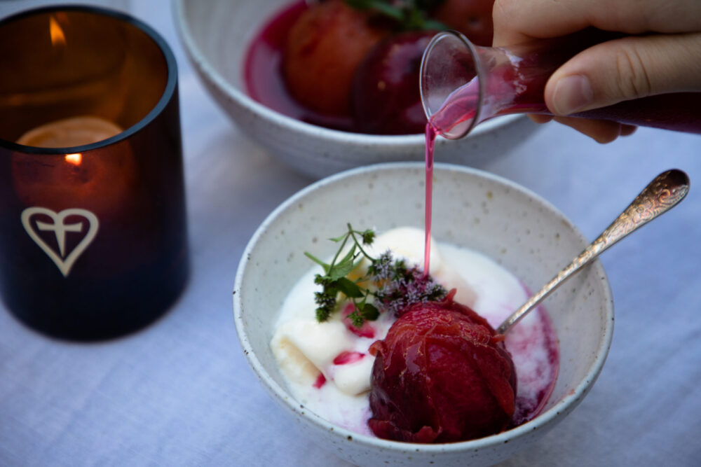 Poached plums with elderflower cordial