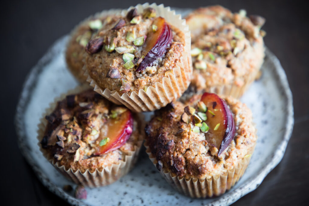 Plum and pistachio almond meal muffins