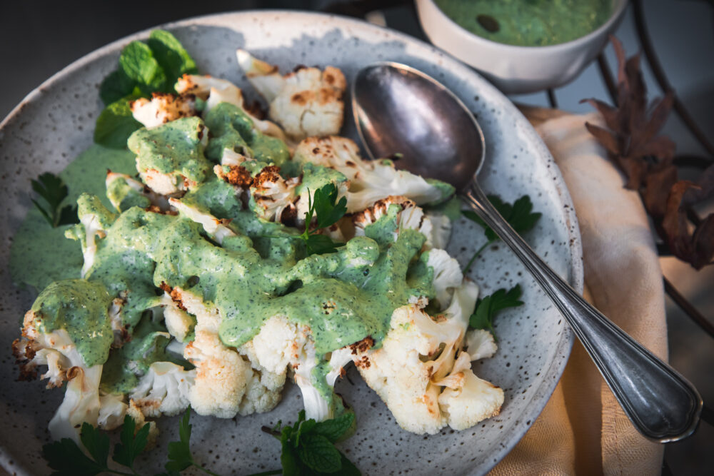 Roasted cauliflower with herbed tahini sauce