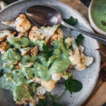 Roasted cauliflower with herbed tahini sauce