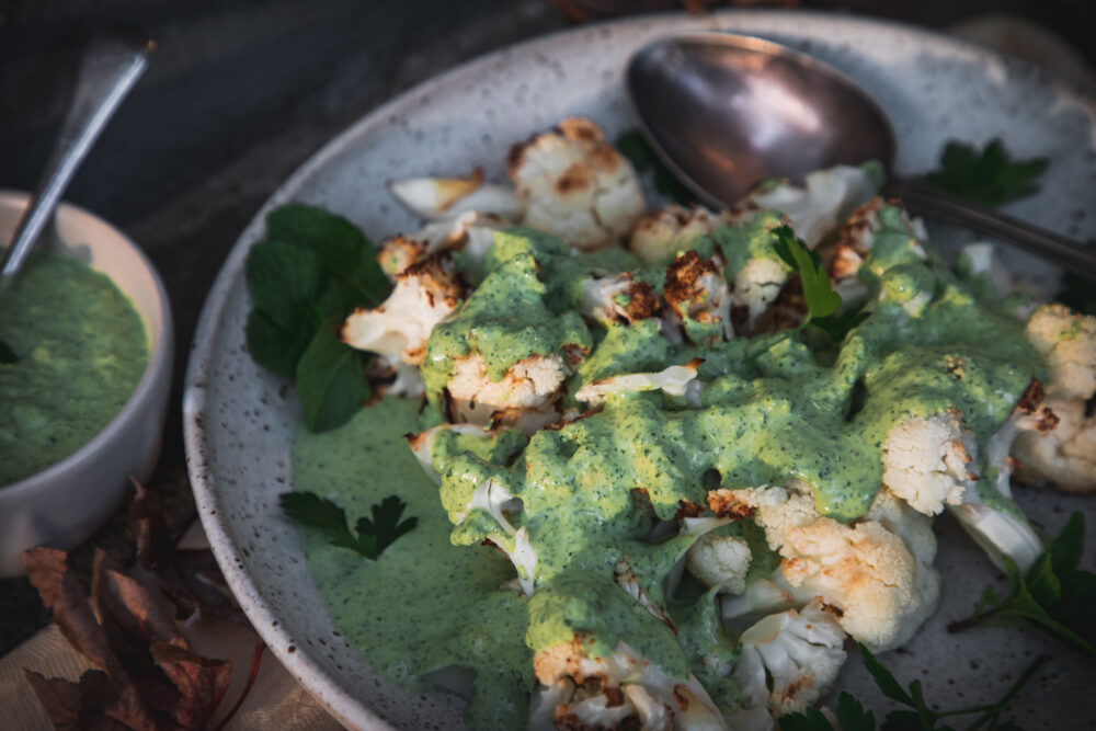 Roasted cauliflower with herbed tahini sauce